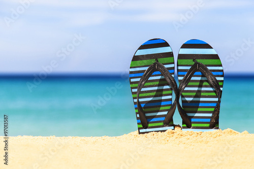 Flip flops on the sandy beach