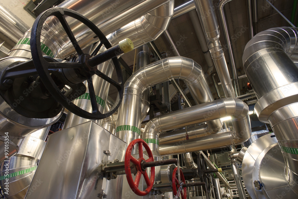 Equipment, cables and piping as found inside of a modern industr Equipment, cables and piping as found inside of a modern industr