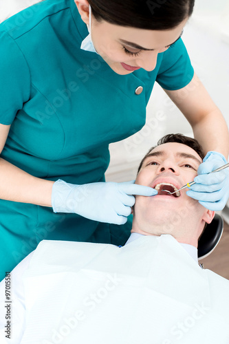 Patient getting dental checkup