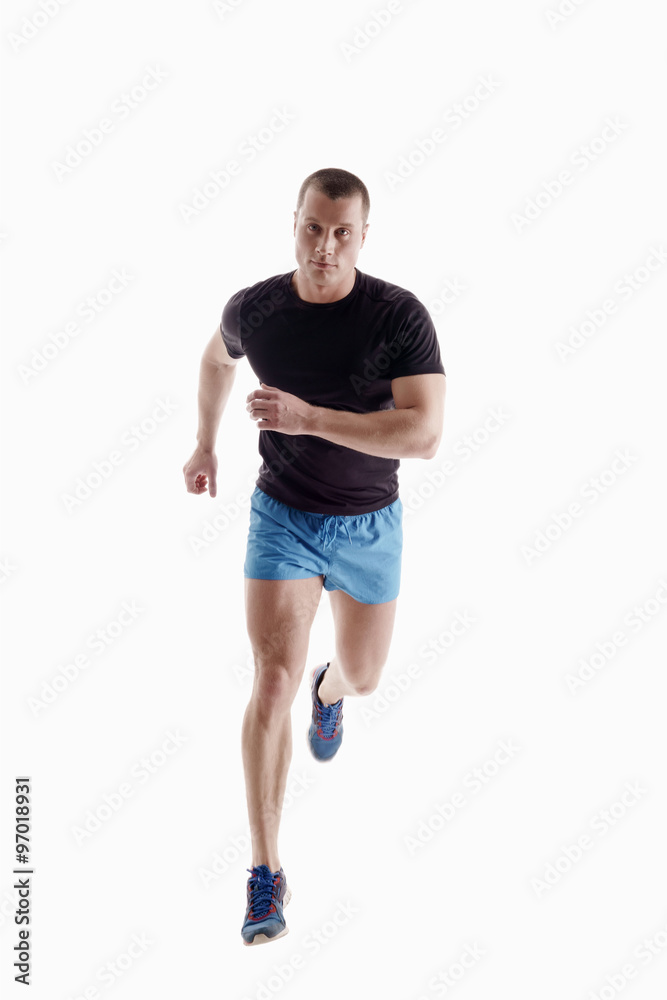 Handsome sportsman runs. Isolated on white Handsome sportsman runs. Isolated on white