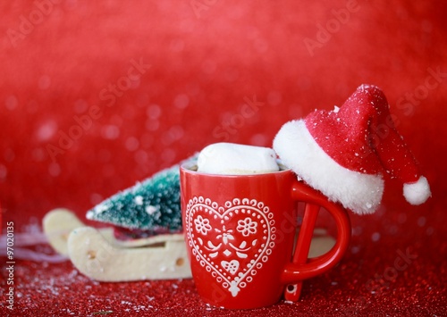 cup of chocolate - coffee with a marshmallow on Christmas background photo