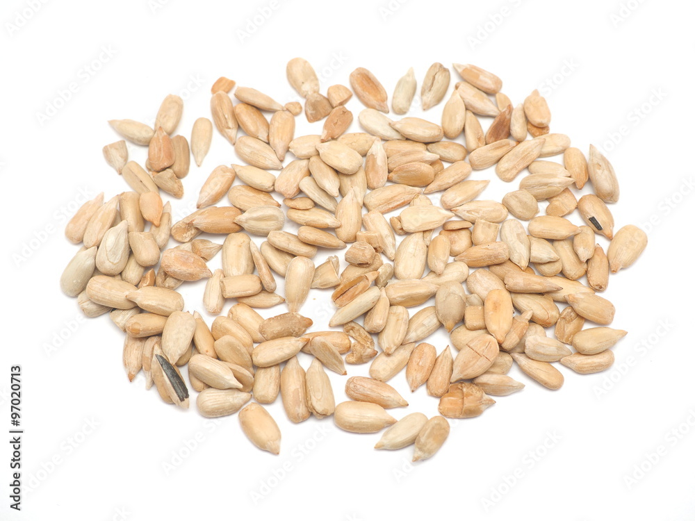 Peeled sunflower seeds on a white background Peeled sunflower seeds on a white background