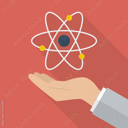 Hand holding atom symbol