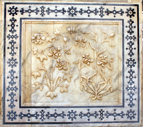 Ancient carved flower on marble in Amber Fort, Jaipur, Rajasthan