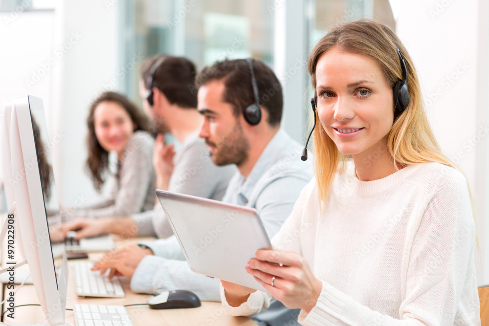 Young attractive woman working in a call center Young attractive woman working in a call center