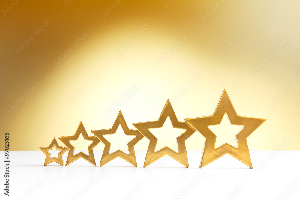 Fototapeta premium 5 stars gold yellow spotlight