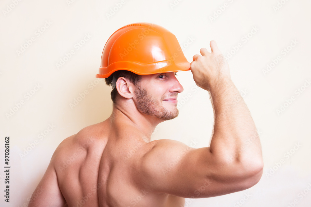 Attractive young man in a helmet