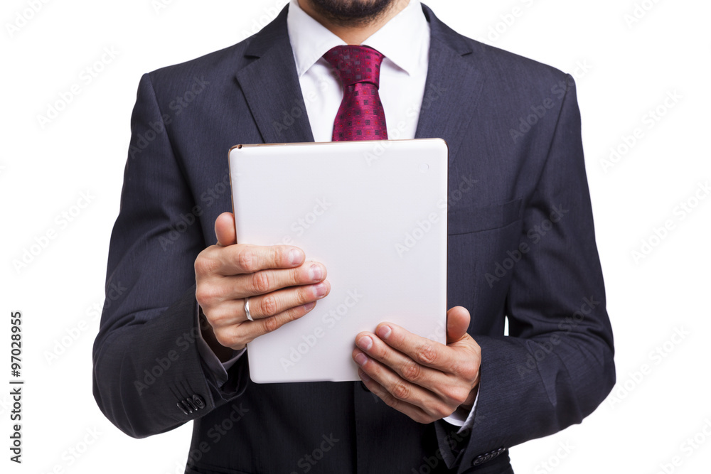 Businessman holding a tablet computer, isolated on white backgro Businessman holding a tablet computer, isolated on white backgro