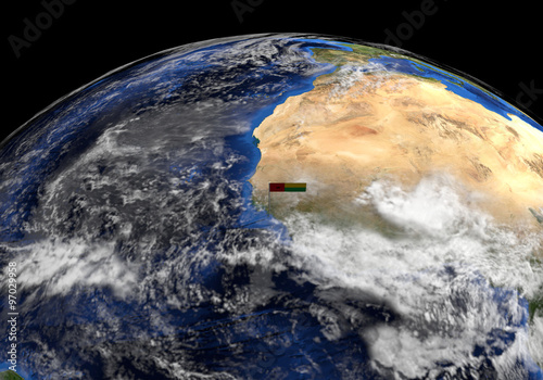 Fototapeta Naklejka Na Ścianę i Meble -  Guinea Bissau flag on pole on earth globe illustration - Elements of this image furnished by NASA