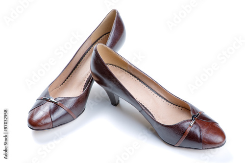 Brown female shoes isolated on a white background