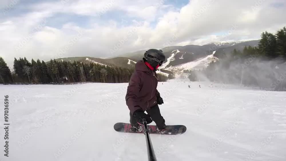 Snowboarder is riding on slope pov Snowboarder is riding on slope pov
