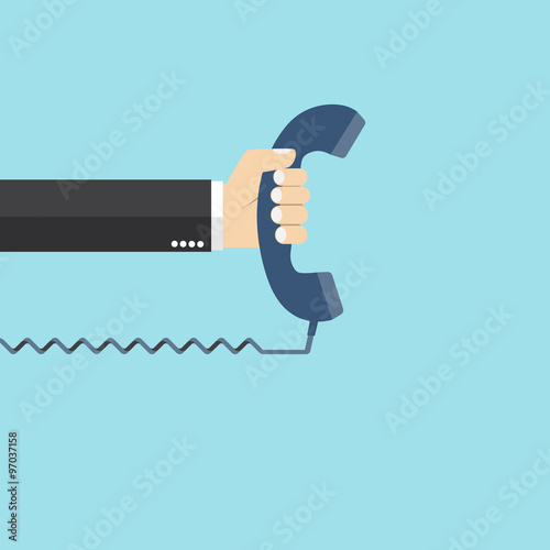 Hand holding telephone