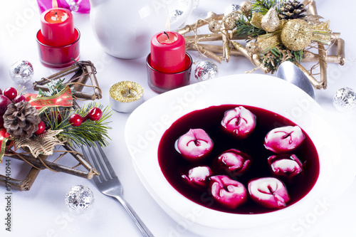 Red borsch with uszka, traditional Christmas Eve dish photo