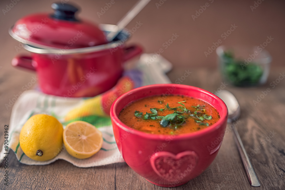 soup on a rustic wooden background with cooking pot soup on a rustic wooden background with cooking pot