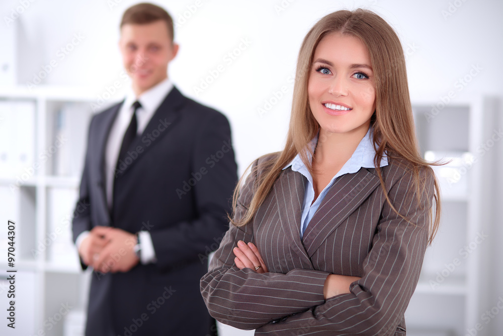 Face of beautiful business woman on the background of business people Face of beautiful business woman on the background of business people