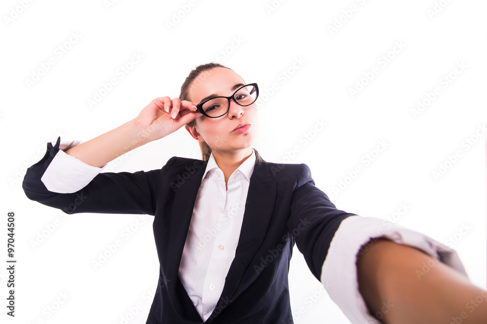 Portrait of a happy business lady blinking her eye while taking selfie with glasses Portrait of a happy business lady blinking her eye while taking selfie with glasses