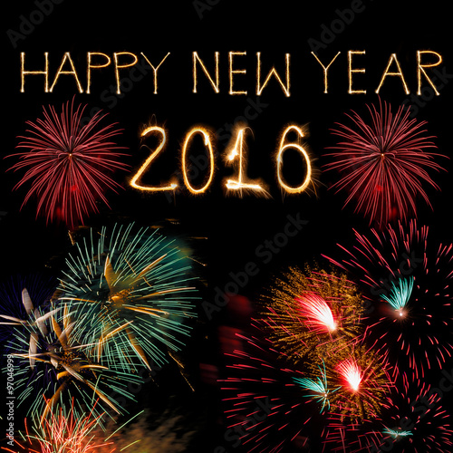Happy new year 2016 written with Sparkle firework on the dark