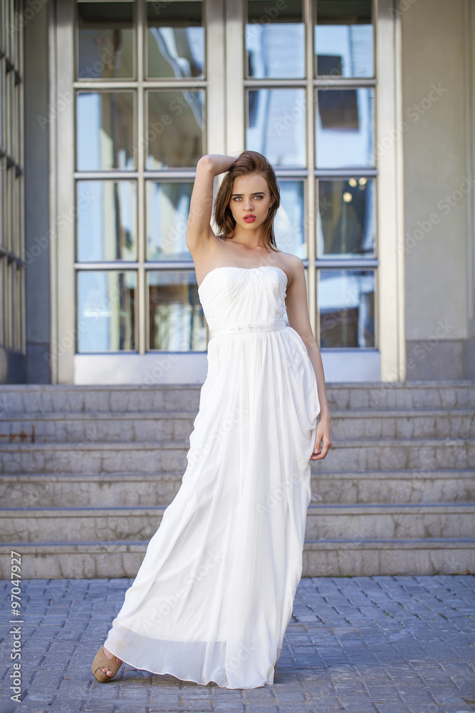 Full length portrait of beautiful model woman with long legs wea Full length portrait of beautiful model woman with long legs wea