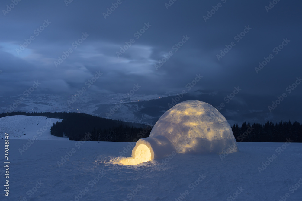 Fototapeta premium Snow igloo in the mountains