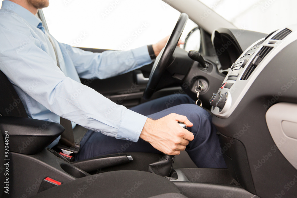 close up of young man driving car