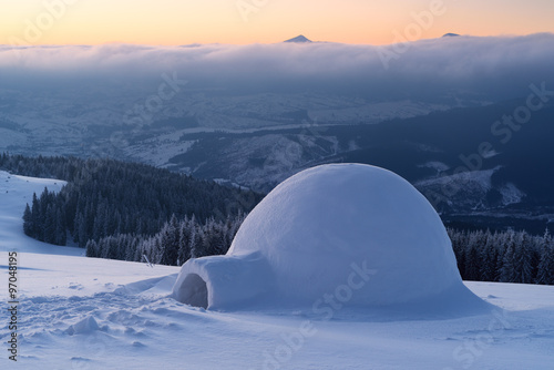 Snow igloo in the mountains © Oleksandr Kotenko