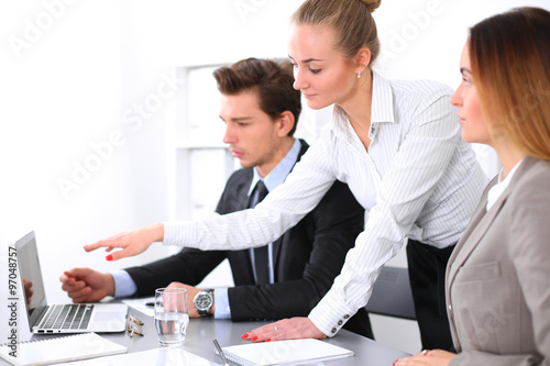 Group of business people working together in office