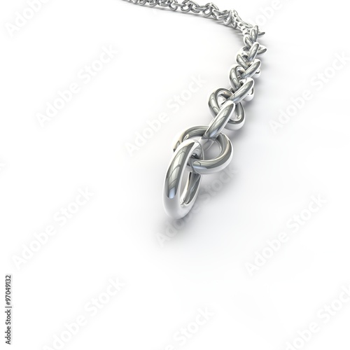 Metal silver chain lying on the floor