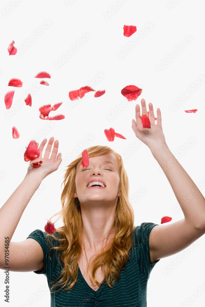 Petals falling on a woman Petals falling on a woman