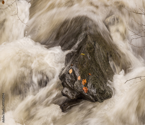 Autumn waterfall following heavy rainfall at Rydal mount, Rydal, Cumbria, UK photo