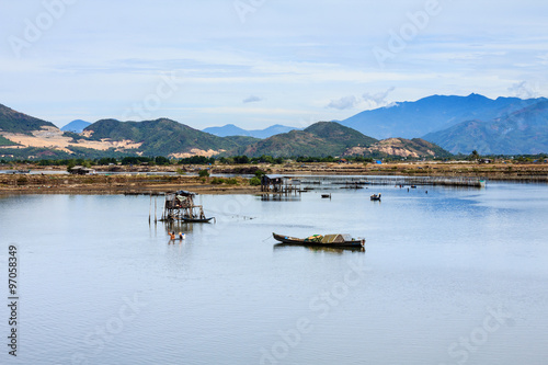 Fisherman at Tac river  Nha Trang  Khanh Hoa  Vietnam. Nha Trang is well known for its beaches and scuba diving and has developed into a destination for international tourists.