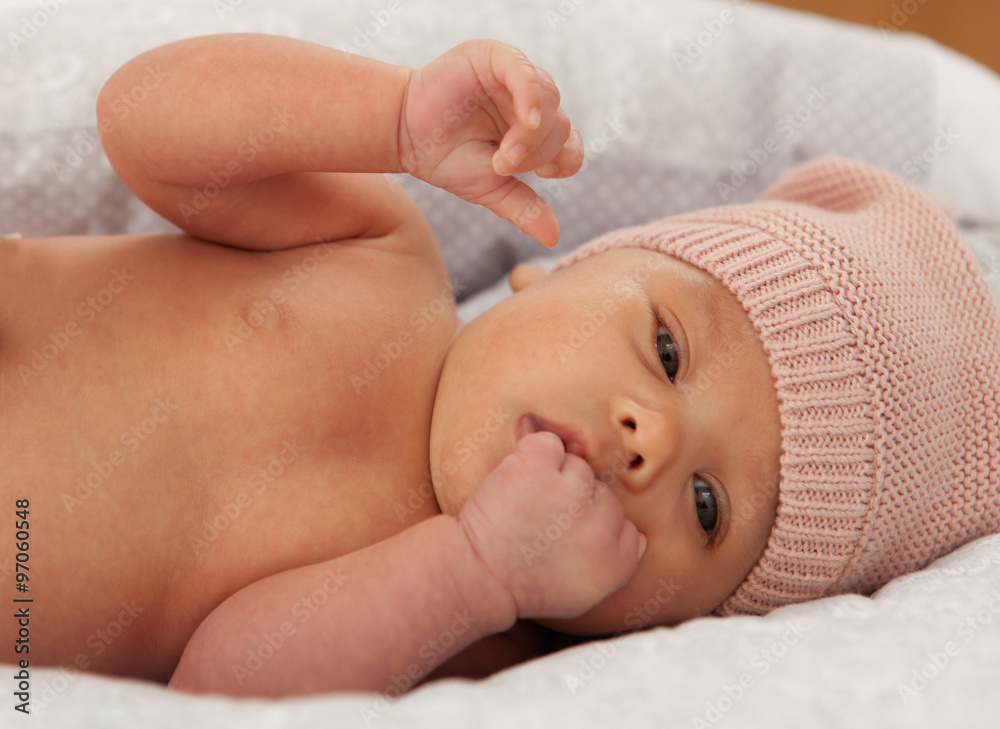 Beautiful baby with wool cap