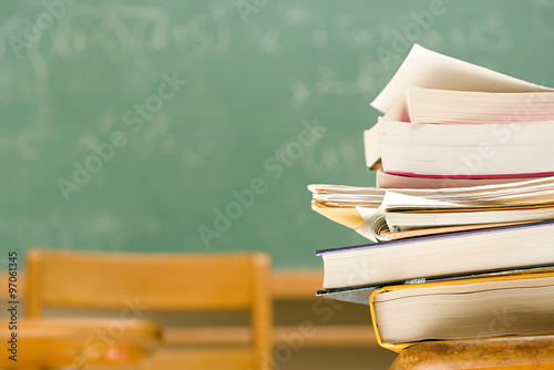 Pile of books on a desk
