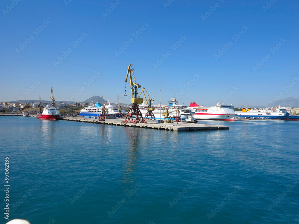 18.06.2015 CRETE, GREECE, Cargo cranes and ship in the sea port