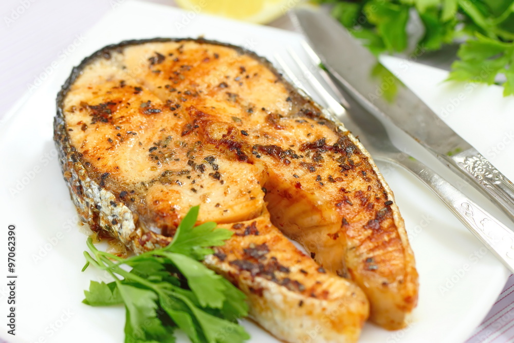 Roasted salmon with lemon and greens