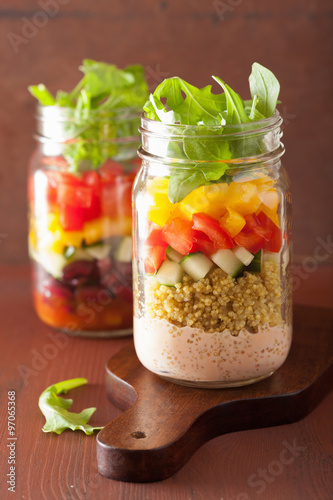 vegan quinoa bean vegetable salad in mason jars