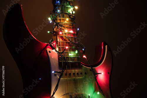electric guitar wrapped by garland