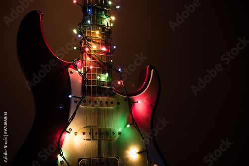 electric guitar wrapped by garland