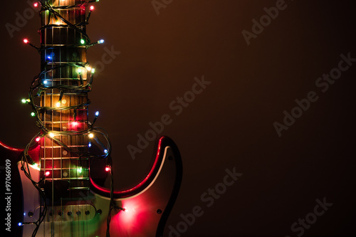electric guitar wrapped by garland
