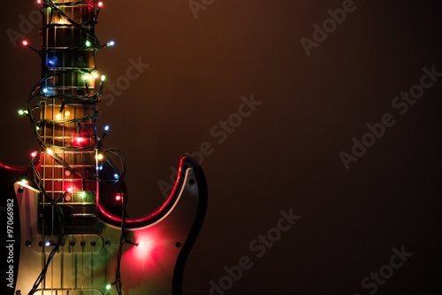 electric guitar wrapped by garland