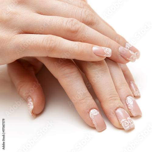 Young woman hands with natural "french" manicure
