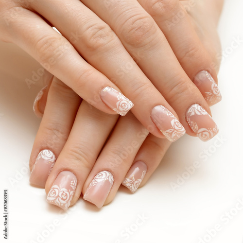 woman hands with natural  french  manicure