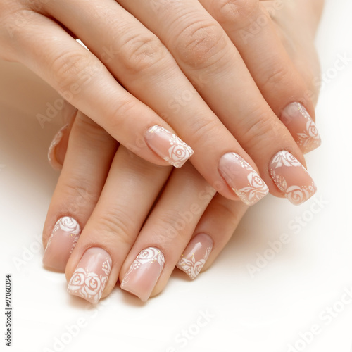 woman hands with natural "french" manicure