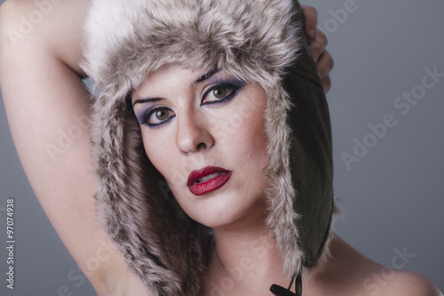 Fototapeta Naklejka Na Ścianę i Meble -  naked girl with Russian winter hat, cold