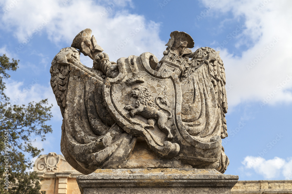 Stone bas-relief with lion before City Gate to the medieval town Mdina, Malta