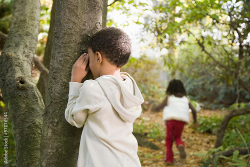 Картината върху платно Children playing hide and seek
