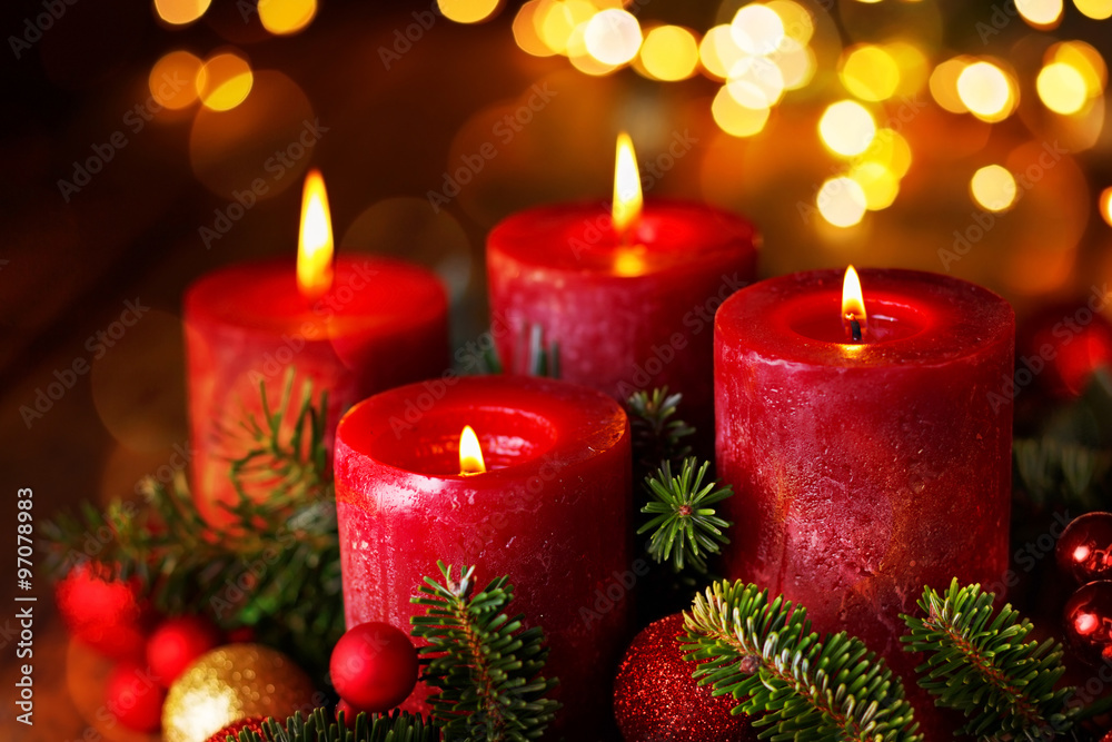 Four burning candles in festive christmas arrangement, 4. Advent Four burning candles in festive christmas arrangement, 4. Advent