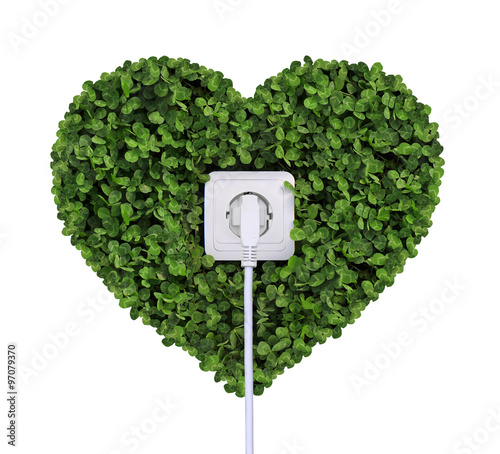 electric power receptacle on a green grass background isolated o