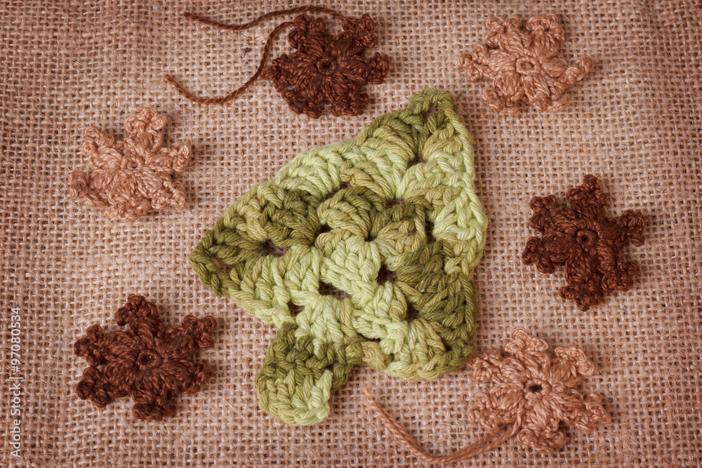 New year decoration with handmade crochet christmas tree and sno New year decoration with handmade crochet christmas tree and sno