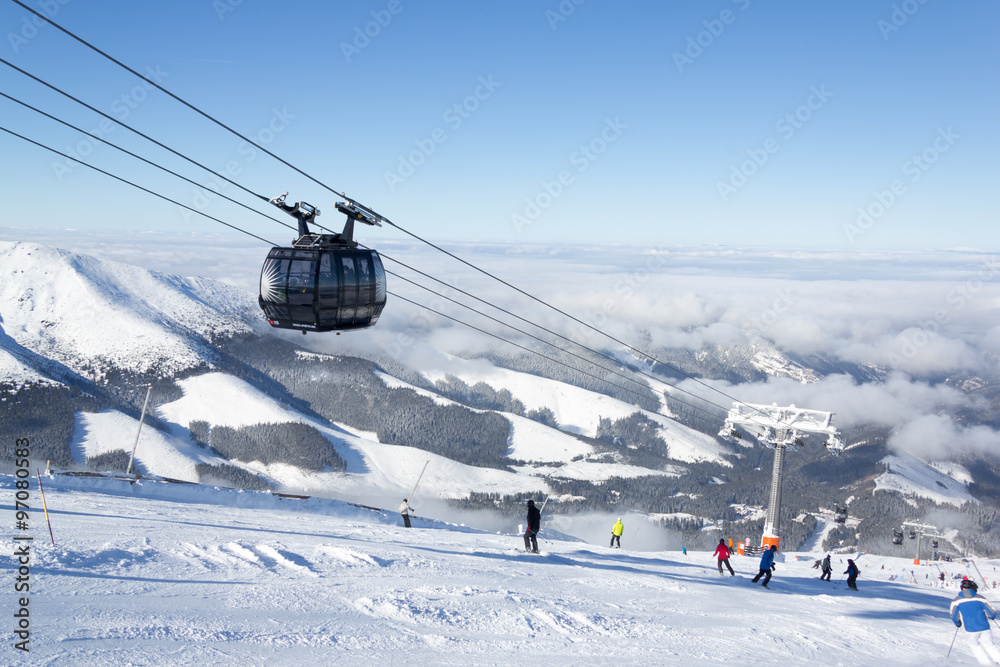 Skiers and snowboarders enjoying good snow Skiers and snowboarders enjoying good snow