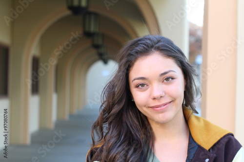 A portrait of a mixed race college student at campus photo